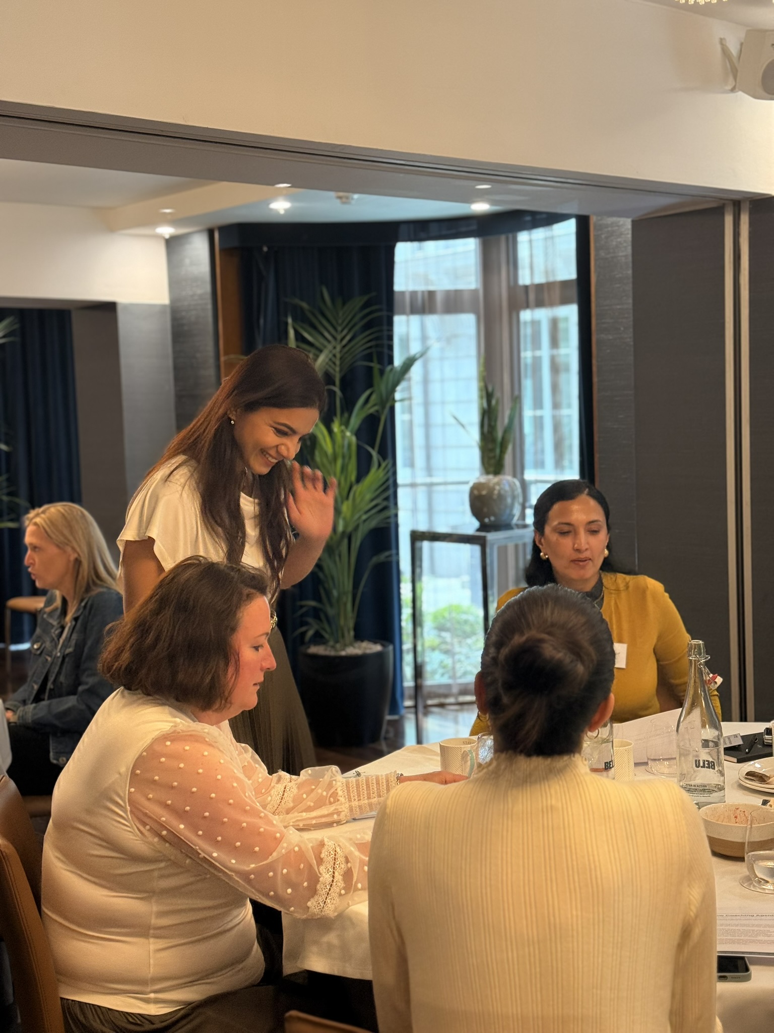 Khyati Pal facilitating a small-group discussion during an executive AI programme
